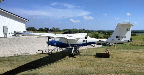 A plane parked on a fieldAI-generated content may be incorrect.