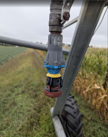 A close-up of a sprinklerAI-generated content may be incorrect.