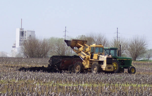 A tractor in a fieldAI-generated content may be incorrect.