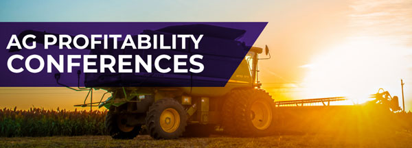 A large tractor with a purple and yellow trailerAI-generated content may be incorrect.